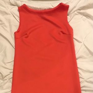 1 tangerine and 1 red dress
